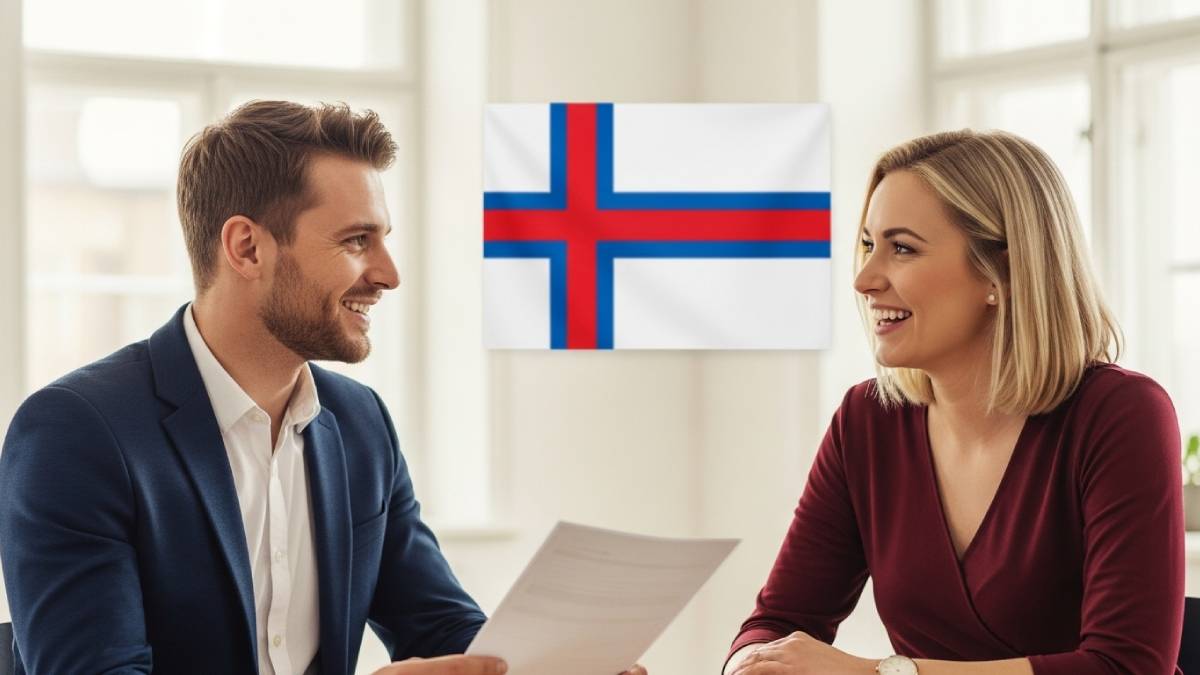 Traducteur avec client féroïen, bureau lumineux, drapeau des îles Féroé bien visible.